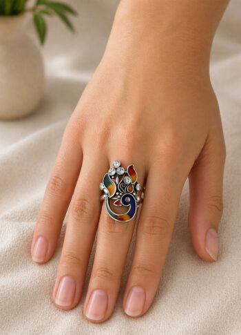 100% pure silver handmade peacock design with enamel color and zirconia stone work on it. Oxide silver work