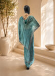 Elegant mannequin in teal sari display – front