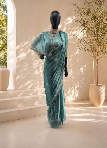 Turquoise Georgette Saree with Silver Zari & Glass Work – Handcrafted Designer Party Wear