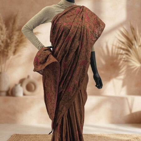 Draped in tradition, this saree weaves a story of timeless elegance with its intricate red embroidery - front
